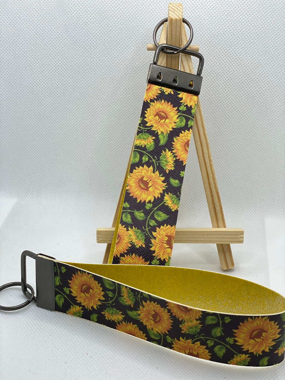 Sunflower (Black Background) Faux Leather Wristlet