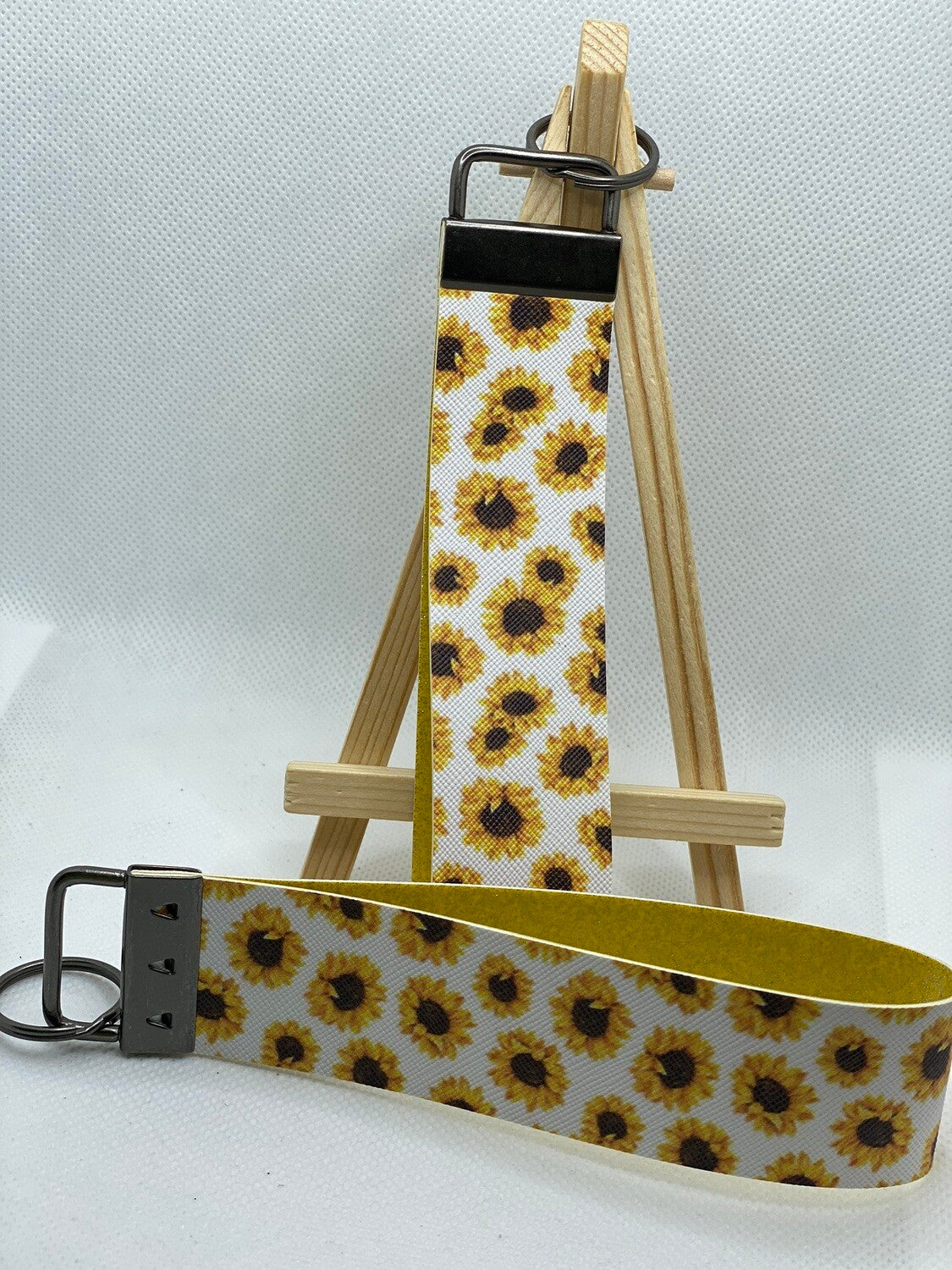 White background Sunflower Faux Leather Wristlet Keychain