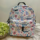 Pink Floral Books - Water-Resistant Mini Backpack