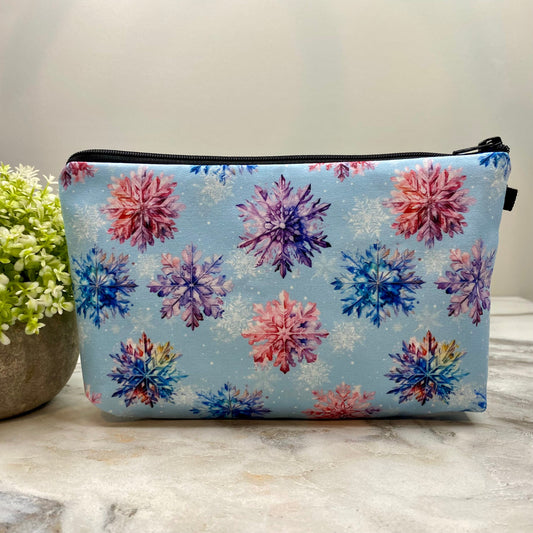 Snowflake on Blue - Water-Resistant Multi-Use Pouch