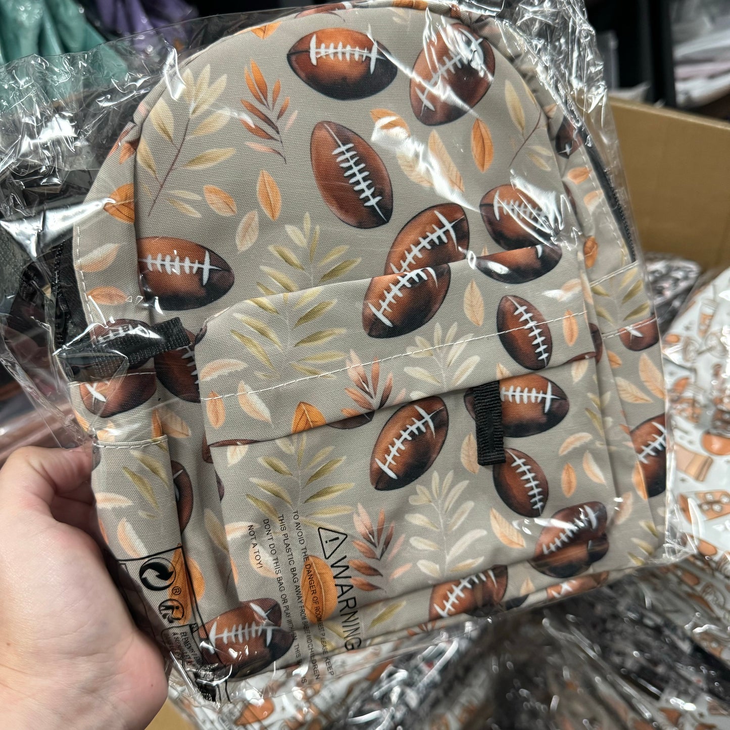 Football Leaves - Water-Resistant Mini Backpack