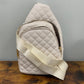 The Faux Leather Quilted Sling Crossbody - Cream