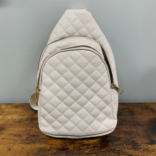 The Faux Leather Quilted Sling Crossbody - Cream