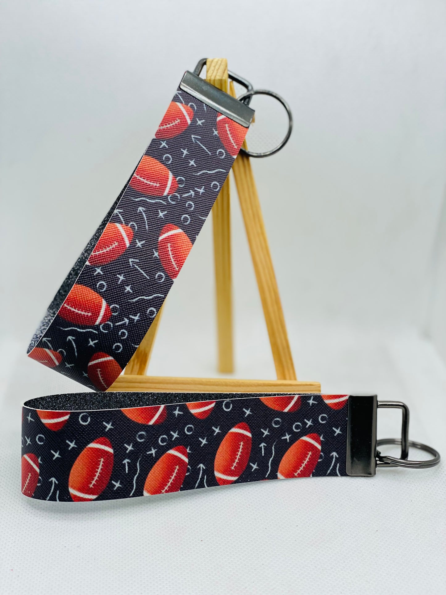 Football (Black Background) - Defense - Linebacker -  Faux Leather Wristlet Keychain